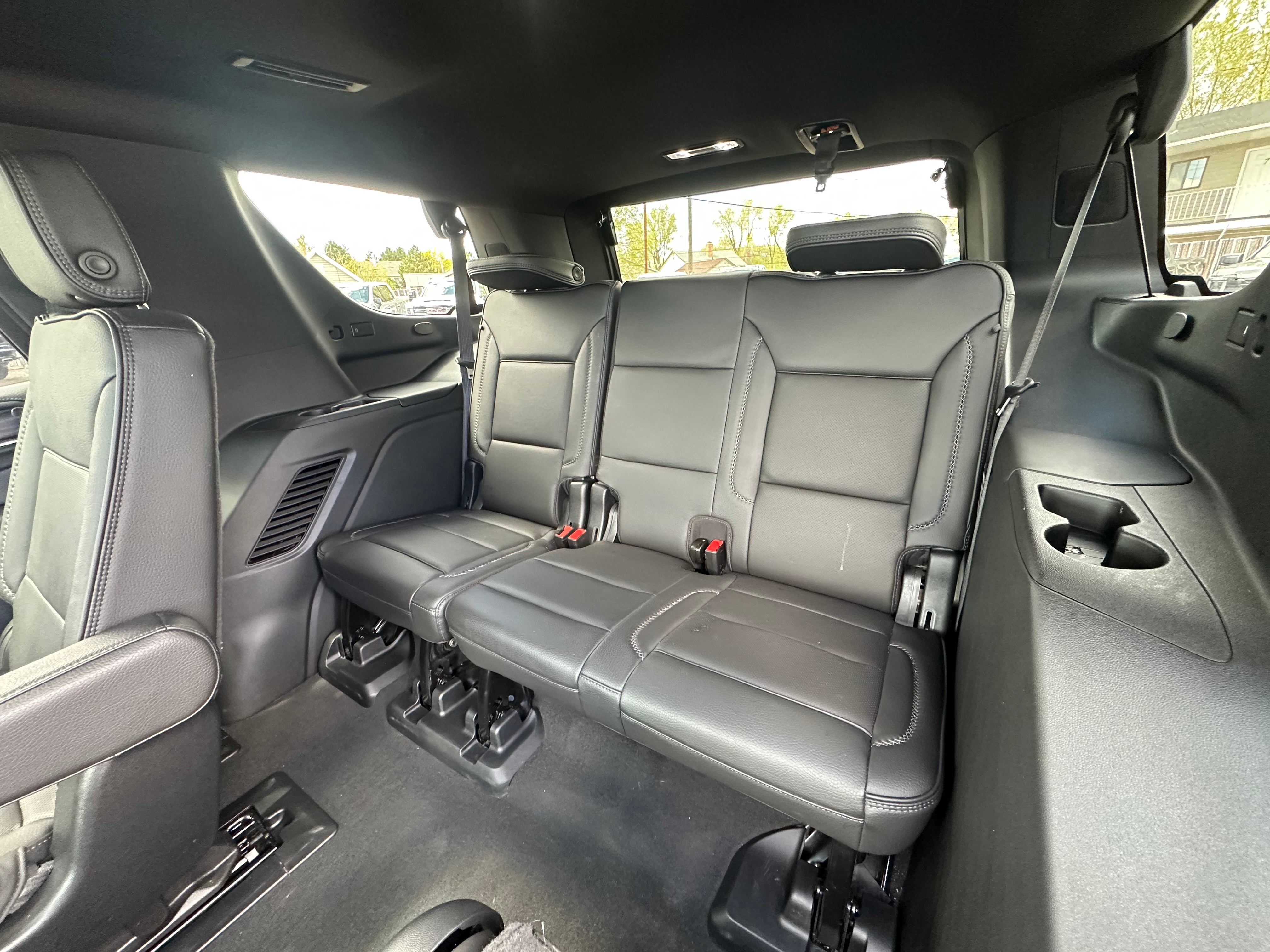 2024 GMC Yukon Denali in Onyx Black — front three-quarter view