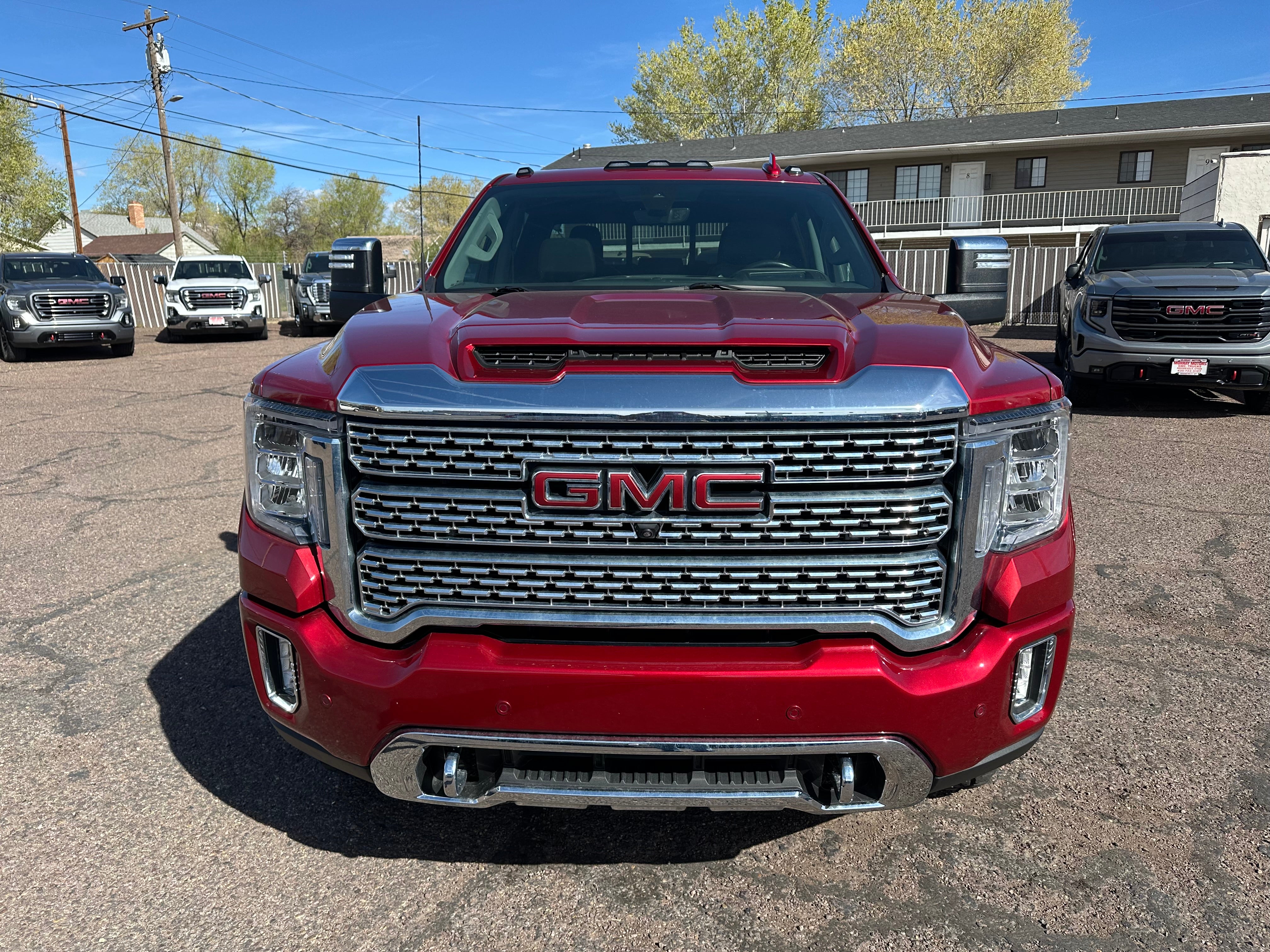 2022 GMC Sierra 3500 HD Denali in Cayenne Red Tintcoat — front three-quarter view