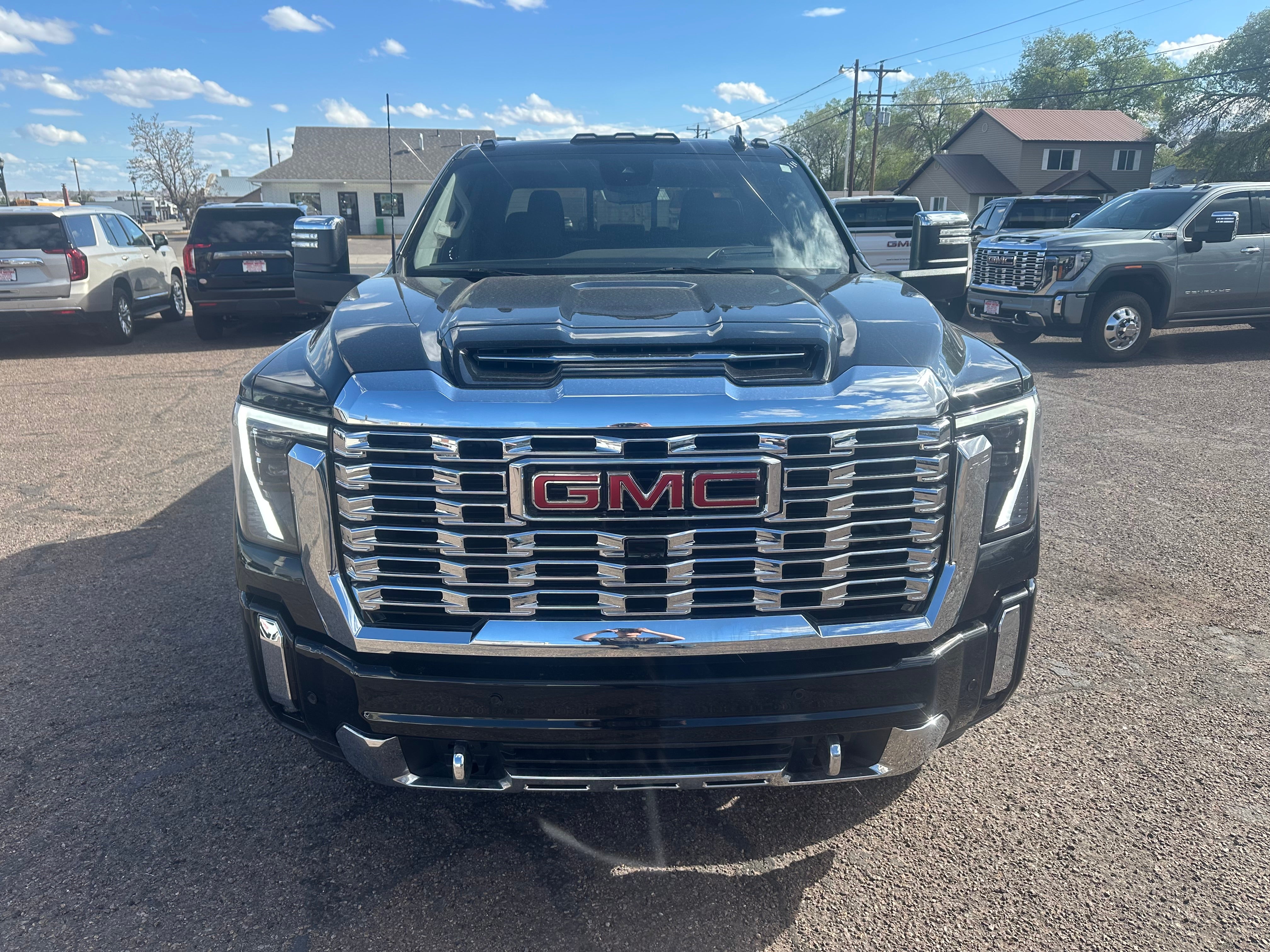2024 GMC Sierra 3500 HD Denali in Onyx Black — front three-quarter view