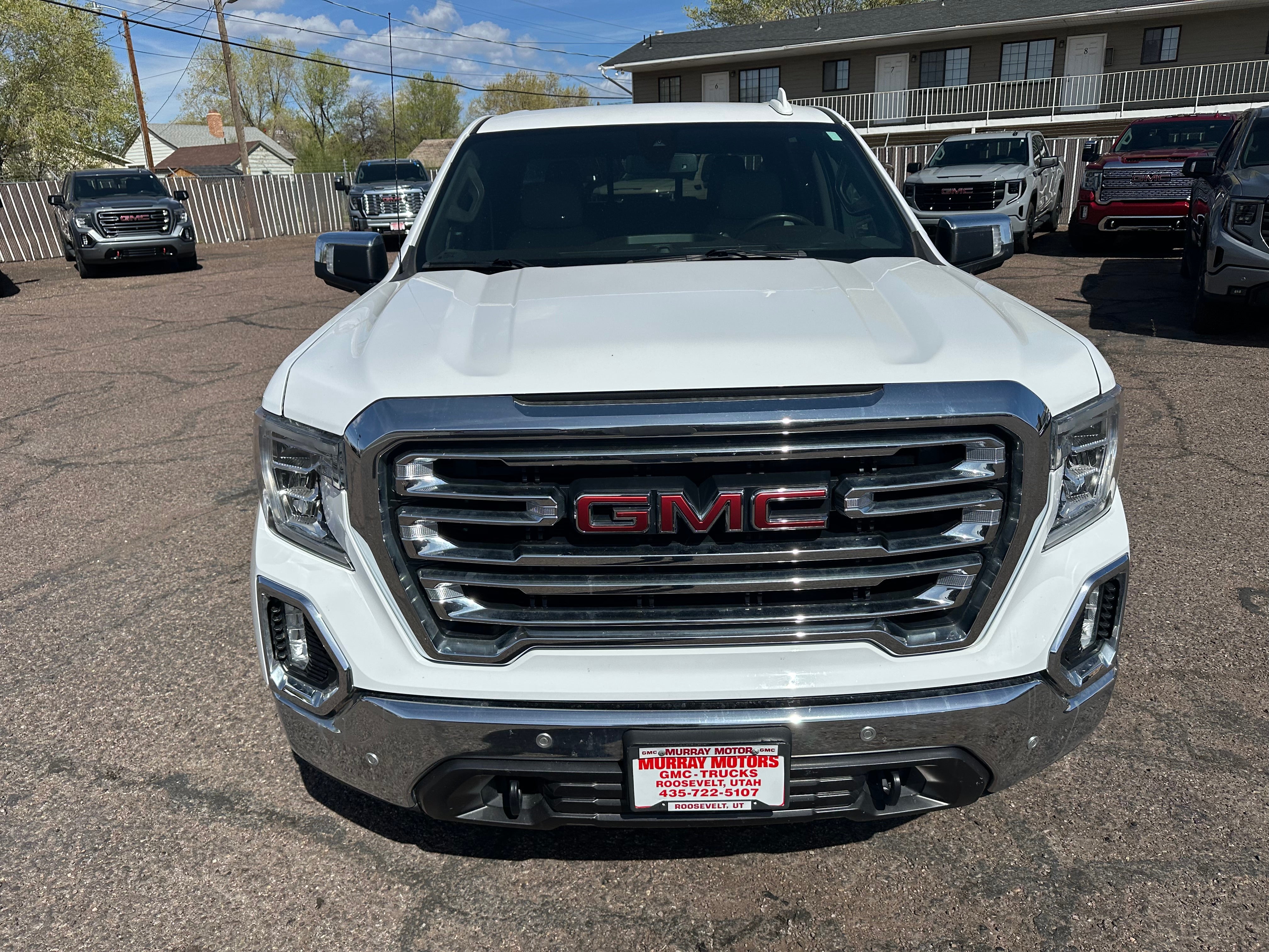 2021 GMC Sierra 1500 SLT in Summit White — front three-quarter view