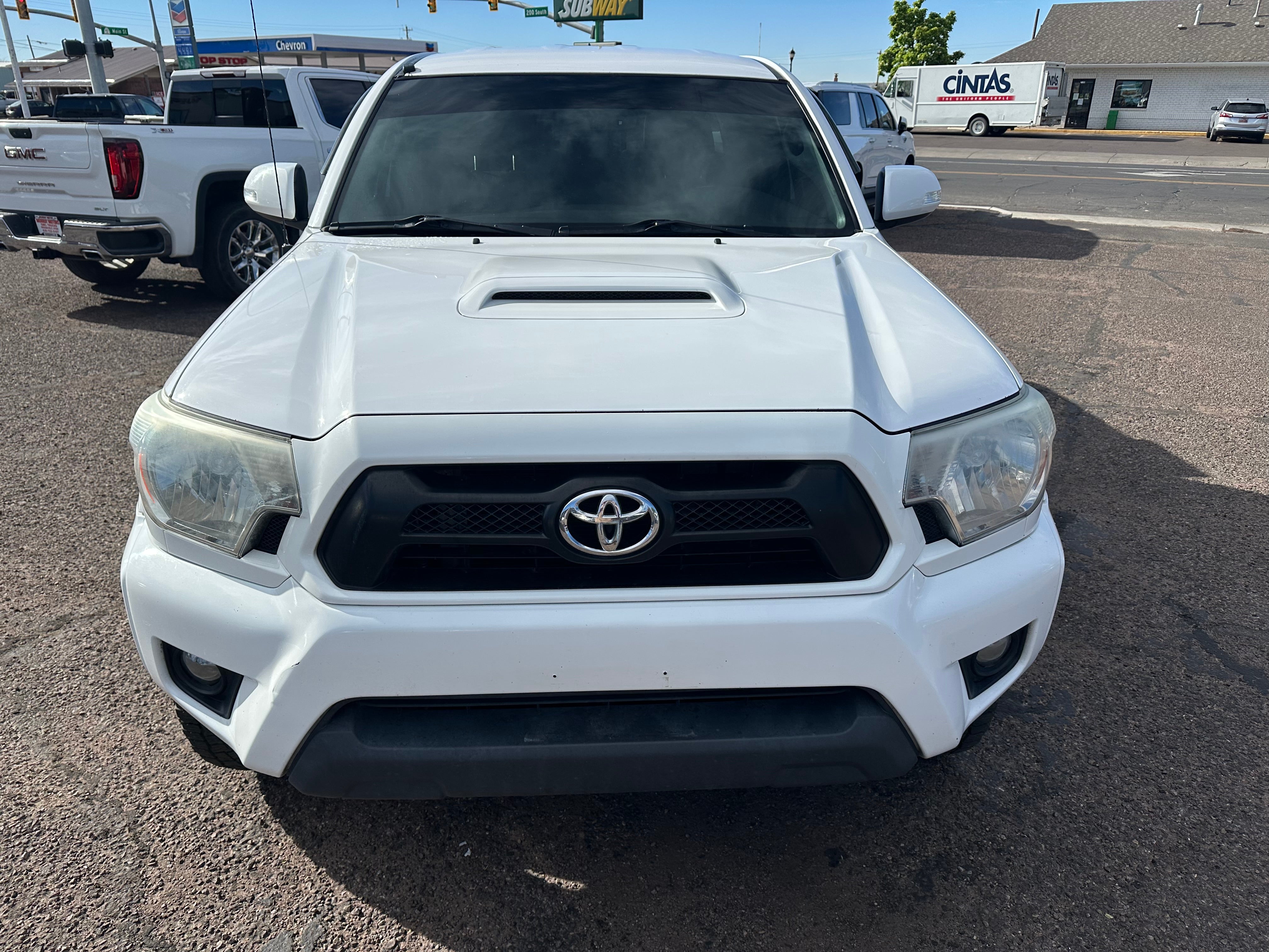 2012 Toyota Tacoma PreRunner in White — front three-quarter view