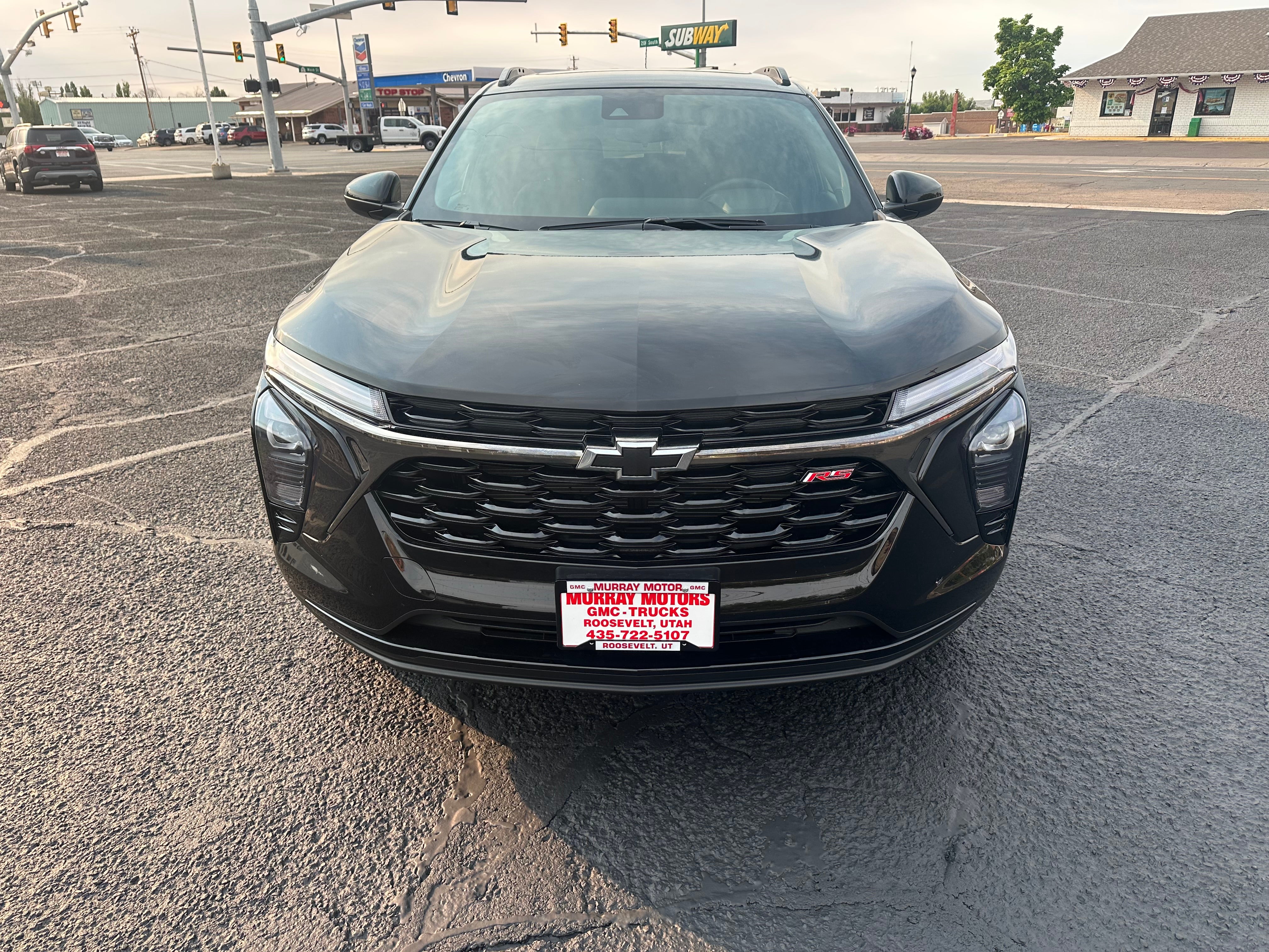 2026 Chevrolet Trax 2RS in Mosaic Black Metallic — front three-quarter view